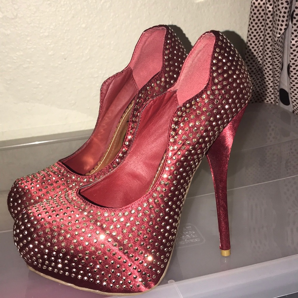 Bedazzled red pumps